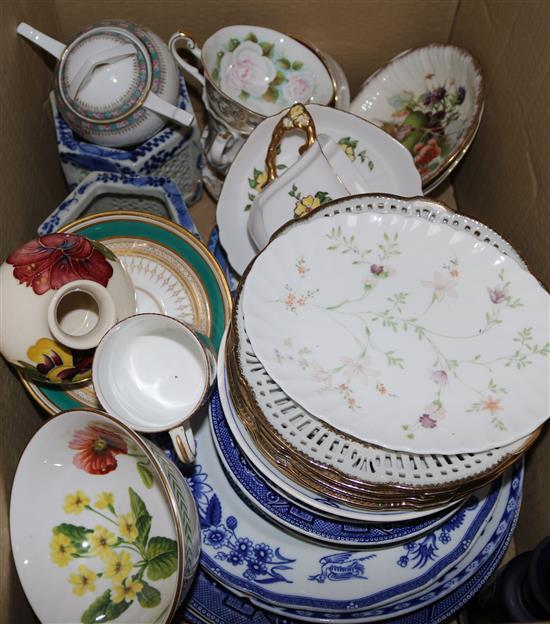 A Moorcroft vase, decorative cups and saucers and blue and white pottery